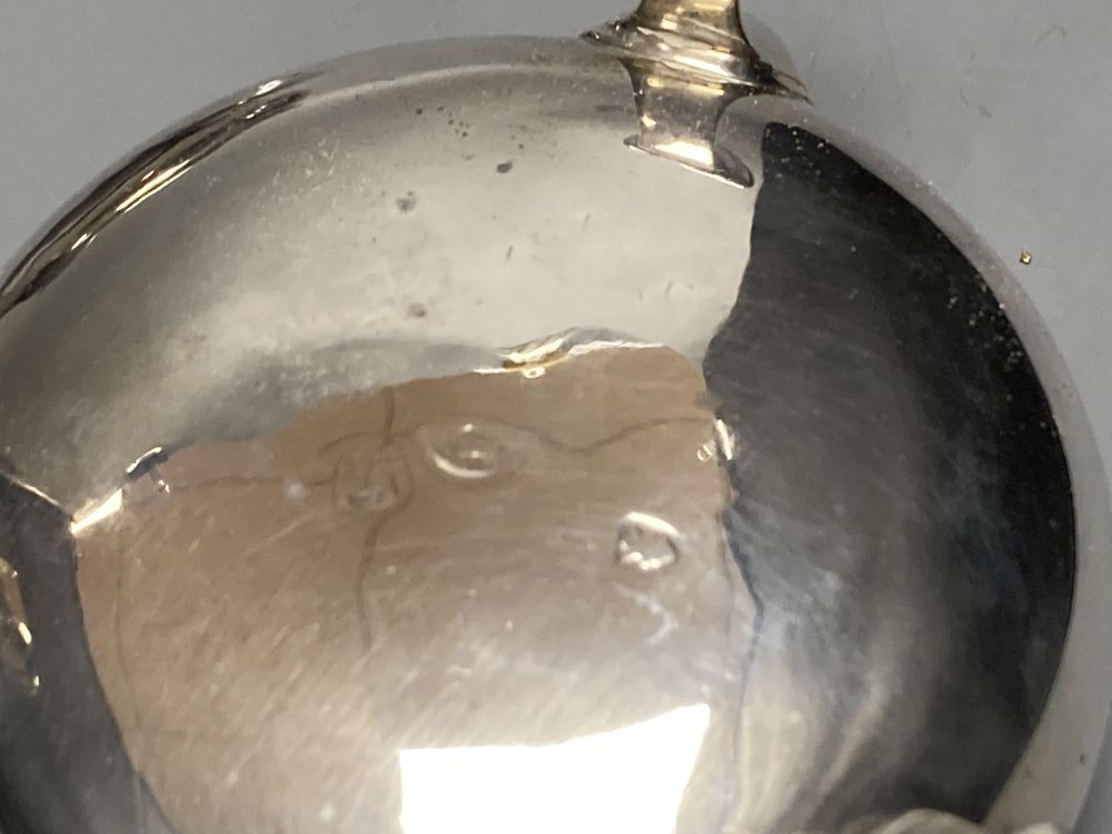 A pair of Georgian silver circular salts, a George III urn-shaped pepper pot and 4 various spoons.